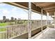 Enjoy stunning views from this charming balcony overlooking lush greenery and city skyline at 1200 N Humboldt St # 1204, Denver, CO 80218
