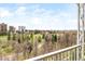 Enjoy stunning views from this charming balcony overlooking lush greenery and city skyline at 1200 N Humboldt St # 1204, Denver, CO 80218