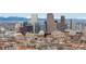 Wonderful city view featuring towering skyscrapers against a backdrop of snow-capped mountains, showcasing a vibrant city center at 1200 N Humboldt St # 1204, Denver, CO 80218
