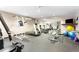 Community gym with workout equipment and mirrored wall at 1200 N Humboldt St # 1204, Denver, CO 80218