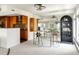 Open-concept living space featuring an eat-in kitchen and bar, with a spacious living area at 1200 N Humboldt St # 1204, Denver, CO 80218