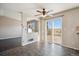 Inviting dining room area featuring an open floor plan and sliding glass doors to the back patio at 7904 Mule Deer Pl, Littleton, CO 80125