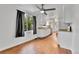 Bright kitchen with white cabinets, granite countertops, and stainless steel appliances at 4155 S Lipan St, Englewood, CO 80110
