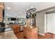 Bright kitchen features wooden cabinetry, granite countertops, and stainless steel appliances at 11866 High Desert Rd, Parker, CO 80134