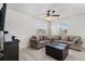 Cozy living room with plush seating and ample natural light at 11866 High Desert Rd, Parker, CO 80134
