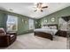 Spacious main bedroom with large bed and ample natural light at 11866 High Desert Rd, Parker, CO 80134