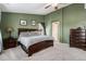 Spacious main bedroom with large bed and ample natural light at 11866 High Desert Rd, Parker, CO 80134