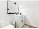 Bright bathroom with a modern vanity, stylish fixtures, and contemporary design at 236 Harris Dr, Idaho Springs, CO 80452