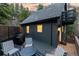 Outdoor deck with seating and a fire pit, perfect for entertaining and enjoying the outdoors at 236 Harris Dr, Idaho Springs, CO 80452
