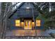 Inviting front view of home featuring a charming porch and well-lit entrance at 236 Harris Dr, Idaho Springs, CO 80452