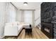 Inviting living room features a black stone fireplace and comfortable seating area at 236 Harris Dr, Idaho Springs, CO 80452