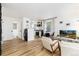 Open floor plan with modern appliances, dining area, and stylish living room setup at 236 Harris Dr, Idaho Springs, CO 80452