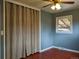 Bedroom featuring natural light from a window, and hardwood flooring at 1500 S Perry St, Denver, CO 80219