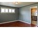 Cozy living room featuring hardwood floors, neutral wall colors, and ample natural light at 1500 S Perry St, Denver, CO 80219