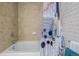 Bathroom tub and shower with stylish curtain and fixtures at 1975 N Grant St # 509, Denver, CO 80203