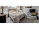 Bright bedroom with city views, cozy decor, and a comfortable bed at 1975 N Grant St # 509, Denver, CO 80203