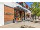 Las Delicias Restaurant facade featuring wood siding and a clean entrance on a sunny day in a great neighborhood at 1975 N Grant St # 509, Denver, CO 80203