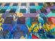 Vibrant mural adorning the side of a brick building featuring a wolf, deer, and colorful abstract designs at 1975 N Grant St # 509, Denver, CO 80203