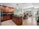 Open floor plan kitchen with stainless steel appliances, bar seating, and connections to the living area at 1975 N Grant St # 509, Denver, CO 80203