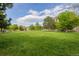 Beautiful park with lush green grass, mature trees, and recreational areas at 1975 N Grant St # 509, Denver, CO 80203