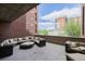 Large outdoor patio with comfortable seating, perfect for relaxation and entertaining at 1975 N Grant St # 509, Denver, CO 80203