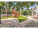 The backyard has a play set and a basketball hoop at 12705 Kalamath Ct, Westminster, CO 80234