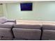Finished basement area offers a comfortable seating area with a large couch and entertainment center at 12705 Kalamath Ct, Westminster, CO 80234