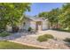 Beautiful home featuring stone accents, a well-maintained lawn, and a three-car garage for ample parking at 12705 Kalamath Ct, Westminster, CO 80234