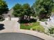 Charming home with a well-maintained front yard, mature trees, and a two-car garage at 12705 Kalamath Ct, Westminster, CO 80234