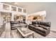 Spacious living room features an open floor plan with hardwood floors and plenty of seating at 12705 Kalamath Ct, Westminster, CO 80234