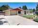 Charming single Gathering home with a manicured lawn, mature trees and a spacious driveway for multiple vehicles at 5067 S Mabre Ct, Littleton, CO 80123