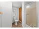 Bright bathroom featuring a standing shower, wood cabinets, and updated fixtures at 5325 Allison St, Arvada, CO 80002