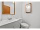 Clean bathroom featuring vanity, sink, and toilet at 5325 Allison St, Arvada, CO 80002