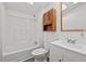 Bathroom featuring a tub, vanity, and toilet at 5325 Allison St, Arvada, CO 80002
