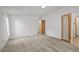 Spacious bedroom showcasing carpeted floors, neutral walls, and natural light at 5325 Allison St, Arvada, CO 80002