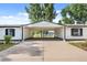 A view of the carport featuring a spacious, covered parking area at 5325 Allison St, Arvada, CO 80002
