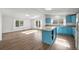 Spacious kitchen with a large island, modern appliances, and plenty of counter space at 5325 Allison St, Arvada, CO 80002