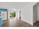 Open-concept living room with sliding glass doors leading to outdoor space at 5325 Allison St, Arvada, CO 80002