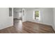 Cozy living room featuring new floors and an abundance of natural light at 5325 Allison St, Arvada, CO 80002