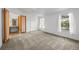 Bright main bedroom featuring carpeted floors and a vanity at 5325 Allison St, Arvada, CO 80002