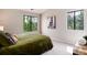 Spacious bedroom with plush carpet, ample natural light, and neutral color palette at 7408 S Alkire St # 301, Littleton, CO 80127