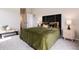 Bedroom featuring plush carpet, modern furnishings, neutral color palette, and natural light at 7408 S Alkire St # 301, Littleton, CO 80127
