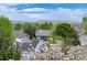 The house boasts amazing mountain views, along with a lovely yard, and solar panels at 7408 S Alkire St # 301, Littleton, CO 80127