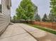 Expansive back patio featuring a large concrete area, ideal for outdoor entertaining and relaxation at 8010 Raspberry Dr, Frederick, CO 80504