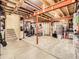 Unfinished basement featuring exposed beams, potential for customization, and ample storage space at 8010 Raspberry Dr, Frederick, CO 80504
