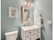 Serene bathroom with a stylish vanity, modern lighting, and a fresh, clean aesthetic at 8010 Raspberry Dr, Frederick, CO 80504