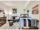 Cozy bedroom with comfortable furnishings, a futon, and stylish decor at 8010 Raspberry Dr, Frederick, CO 80504