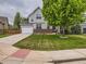 Charming two-story home with a well-manicured lawn and a welcoming front facade at 8010 Raspberry Dr, Frederick, CO 80504