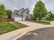 Beautiful home featuring a large driveway, well-maintained lawn, and inviting curb appeal at 8010 Raspberry Dr, Frederick, CO 80504