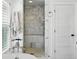 This bathroom features a luxurious marble shower and elegant chrome fixtures, creating a spa-like retreat at 201 S Lafayette St, Denver, CO 80209